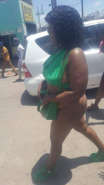 Mzansi lady in green walks the streets naked