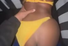 Pull her bikini to the side