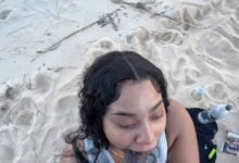 Sucking his dick at the beach