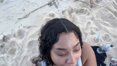 Sucking his dick at the beach