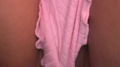 Teasing you with a peak of her fat pussy