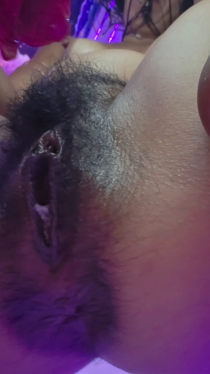Rose vibrator on hairy pussy