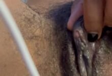 Rubbing her boobs and clit